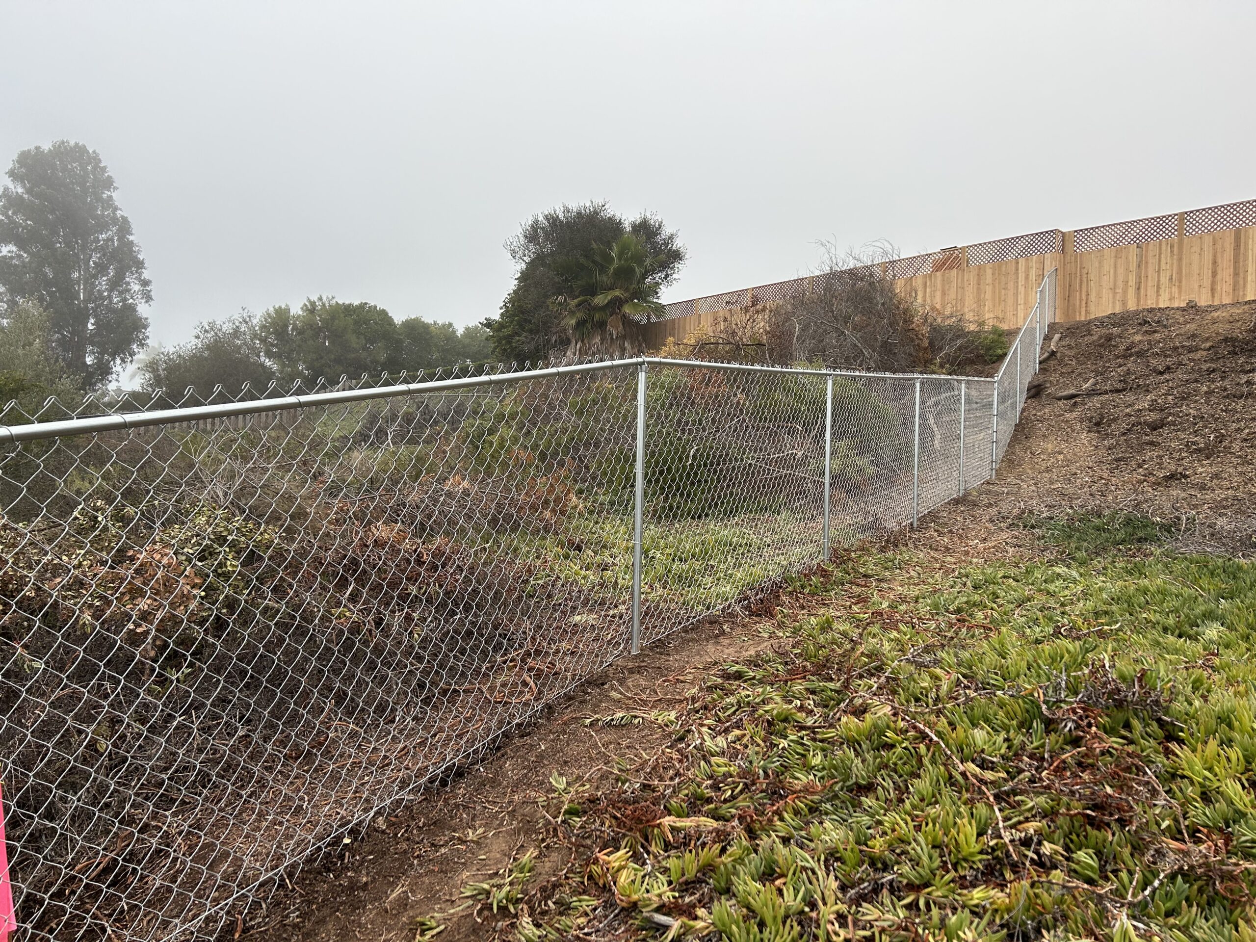 Chain Link Fence in poway chain link fence installed on steep hill in Poway ca.